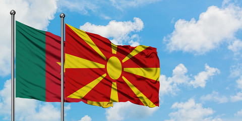 Cameroon and Macedonia flag waving in the wind against white cloudy blue sky together. Diplomacy concept, international relations.