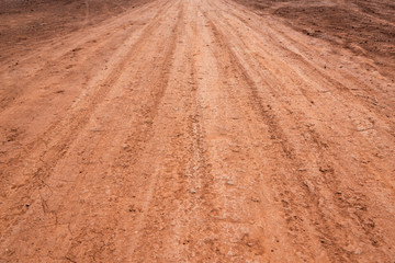 Spacious dirt road low angle texture background