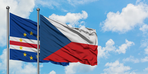 Cape Verde and Czech Republic flag waving in the wind against white cloudy blue sky together. Diplomacy concept, international relations.