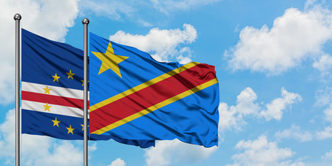 Cape Verde and Congo flag waving in the wind against white cloudy blue sky together. Diplomacy concept, international relations.