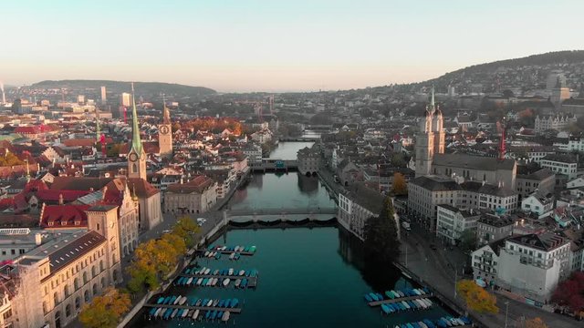 Aerial cityscape flythrough video of Zurich and River Limmat at Sunrise, Switzerland