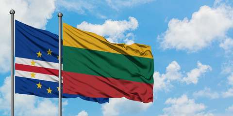 Cape Verde and Lithuania flag waving in the wind against white cloudy blue sky together. Diplomacy concept, international relations.