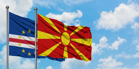 Cape Verde and Macedonia flag waving in the wind against white cloudy blue sky together. Diplomacy concept, international relations.