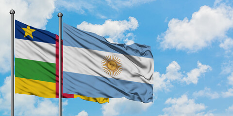 Central African Republic and Argentina flag waving in the wind against white cloudy blue sky together. Diplomacy concept, international relations.