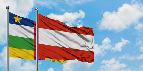 Central African Republic and Austria flag waving in the wind against white cloudy blue sky together. Diplomacy concept, international relations.