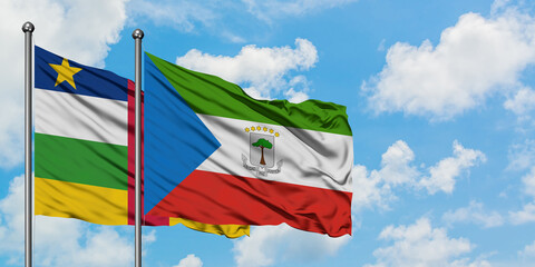 Central African Republic and Equatorial Guinea flag waving in the wind against white cloudy blue sky together. Diplomacy concept, international relations.