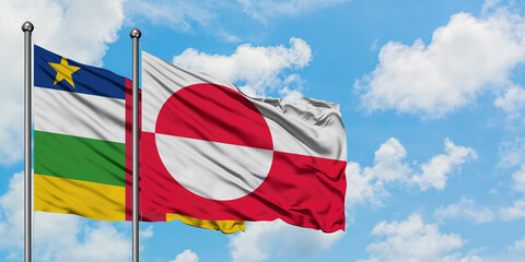 Central African Republic and Greenland flag waving in the wind against white cloudy blue sky together. Diplomacy concept, international relations.