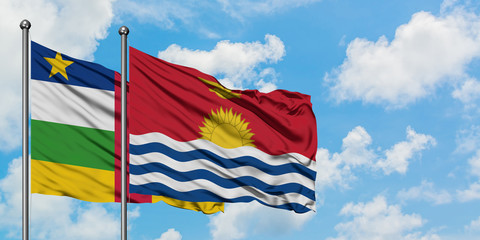 Central African Republic and Kiribati flag waving in the wind against white cloudy blue sky together. Diplomacy concept, international relations.