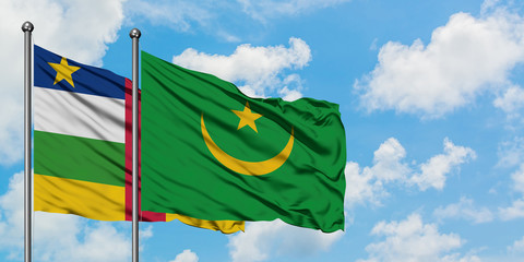Central African Republic and Mauritania flag waving in the wind against white cloudy blue sky together. Diplomacy concept, international relations.