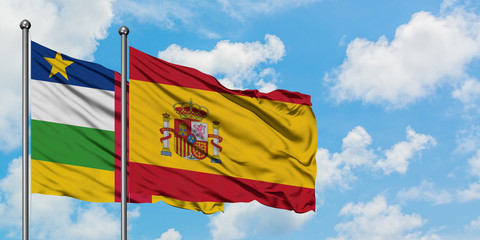Central African Republic and Spain flag waving in the wind against white cloudy blue sky together. Diplomacy concept, international relations.