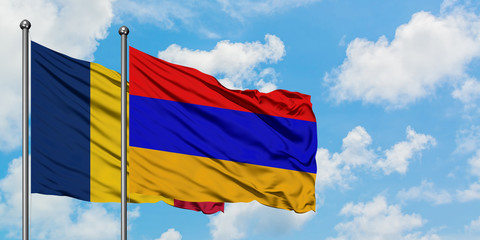 Chad and Armenia flag waving in the wind against white cloudy blue sky together. Diplomacy concept, international relations.