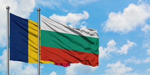 Chad and Bulgaria flag waving in the wind against white cloudy blue sky together. Diplomacy concept, international relations.