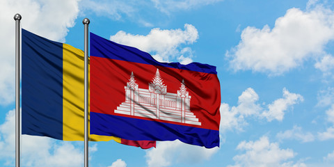 Chad and Cambodia flag waving in the wind against white cloudy blue sky together. Diplomacy concept, international relations.