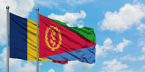 Chad and Eritrea flag waving in the wind against white cloudy blue sky together. Diplomacy concept, international relations.