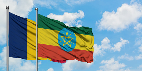 Chad and Ethiopia flag waving in the wind against white cloudy blue sky together. Diplomacy concept, international relations.