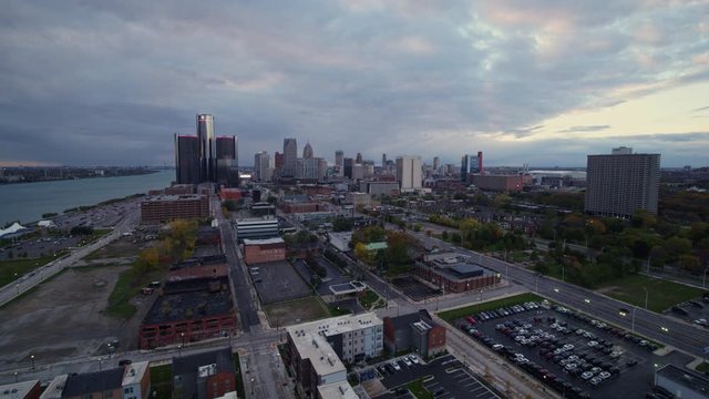 Detroit Michigan Aerial v133 Low vantage fly through heading southwest toward downtown skyline - October 2017