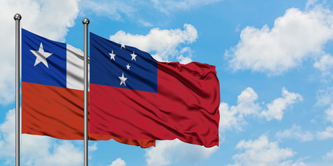 Chile and Samoa flag waving in the wind against white cloudy blue sky together. Diplomacy concept,...