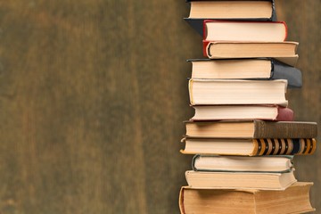 Collection of old books  on background