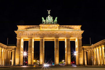 The majestic Brandenburg Gate in Berlin at night © reubergd