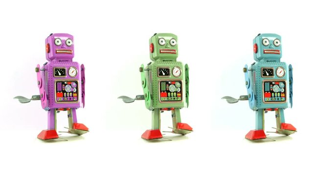 three dancing robots isolated 
