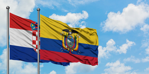 Croatia and Ecuador flag waving in the wind against white cloudy blue sky together. Diplomacy concept, international relations.