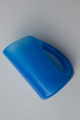 Soft Blue plastic bath mug container.