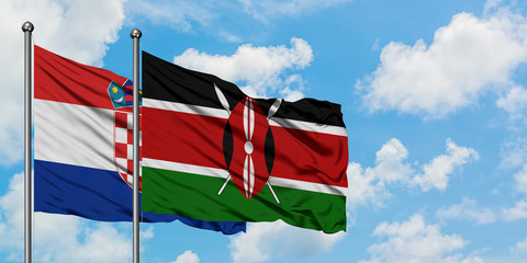 Croatia and Kenya flag waving in the wind against white cloudy blue sky together. Diplomacy concept, international relations.