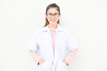 Portrait of young Asian woman wearing gown coat isolated on white wall background. Conceptual of woman staff who working in hospital or clinic.