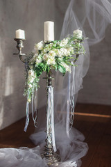 Romantic wedding flower bouquet with candlestick