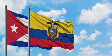 Cuba and Ecuador flag waving in the wind against white cloudy blue sky together. Diplomacy concept, international relations.