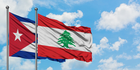 Cuba and Lebanon flag waving in the wind against white cloudy blue sky together. Diplomacy concept,...