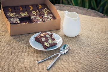 Fudge brownies in white dish on table