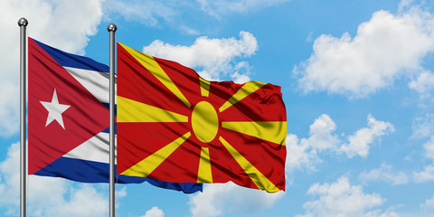 Cuba and Macedonia flag waving in the wind against white cloudy blue sky together. Diplomacy concept, international relations.