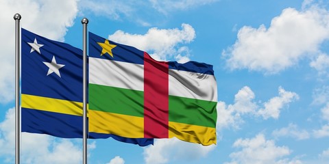 Curacao and Central African Republic flag waving in the wind against white cloudy blue sky together. Diplomacy concept, international relations.