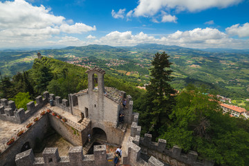 Fototapeta na wymiar View to courtyard inside Second Tower of San Marino as known as Cesta or Fratta, panaramic areal view to Italians hills from mountain Monte Titano