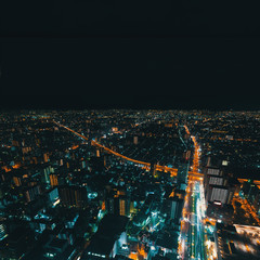 Fototapeta premium Aerial view of the Osaka cityscape at night