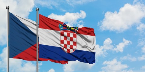 Czech Republic and Croatia flag waving in the wind against white cloudy blue sky together....