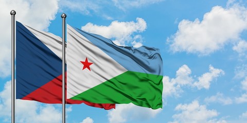 Czech Republic and Djibouti flag waving in the wind against white cloudy blue sky together. Diplomacy concept, international relations.