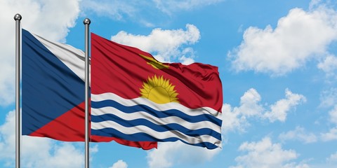 Czech Republic and Kiribati flag waving in the wind against white cloudy blue sky together. Diplomacy concept, international relations.