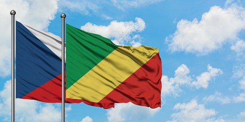 Czech Republic and Republic Of The Congo flag waving in the wind against white cloudy blue sky together. Diplomacy concept, international relations.
