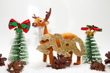 Christmas holiday theme with reindeer and Christmas trees