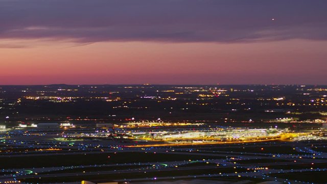 Detroit Michigan Aerial v172 Slow panning sunset dusk airport cityscape looking down over terminal and runways - October 2017