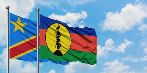 Congo and New Caledonia flag waving in the wind against white cloudy blue sky together. Diplomacy concept, international relations.