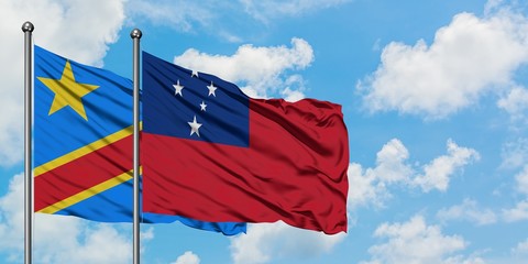 Congo and Samoa flag waving in the wind against white cloudy blue sky together. Diplomacy concept, international relations.