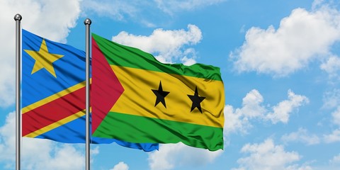 Congo and Sao Tome And Principe flag waving in the wind against white cloudy blue sky together. Diplomacy concept, international relations.
