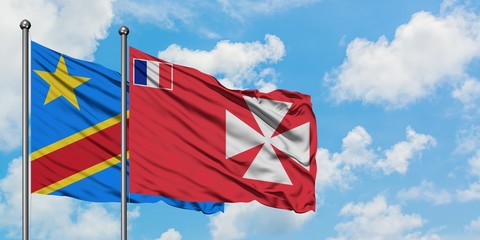Congo and Wallis And Futuna flag waving in the wind against white cloudy blue sky together. Diplomacy concept, international relations.