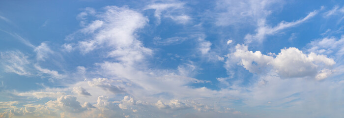 Panorama or panoramic photo of blue sky and white clouds or cloudscape.
