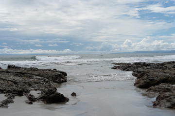 Beautiful close up view of the beach, reef and ocean in Costa Rica