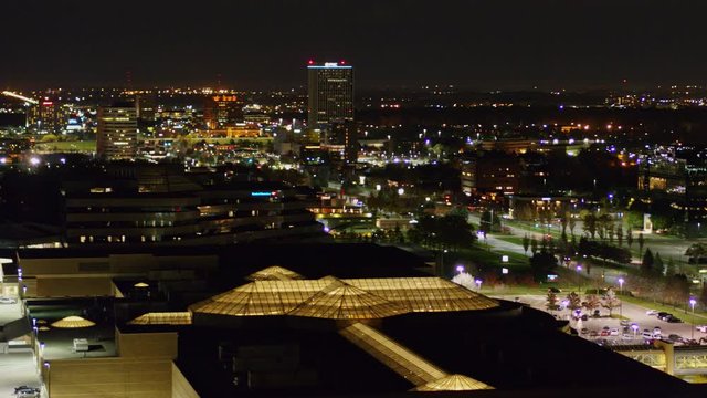 Detroit Michigan Aerial v178 Looking down over mall skylight while descending and panning around at night - October 2017