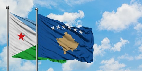 Djibouti and Kosovo flag waving in the wind against white cloudy blue sky together. Diplomacy concept, international relations.